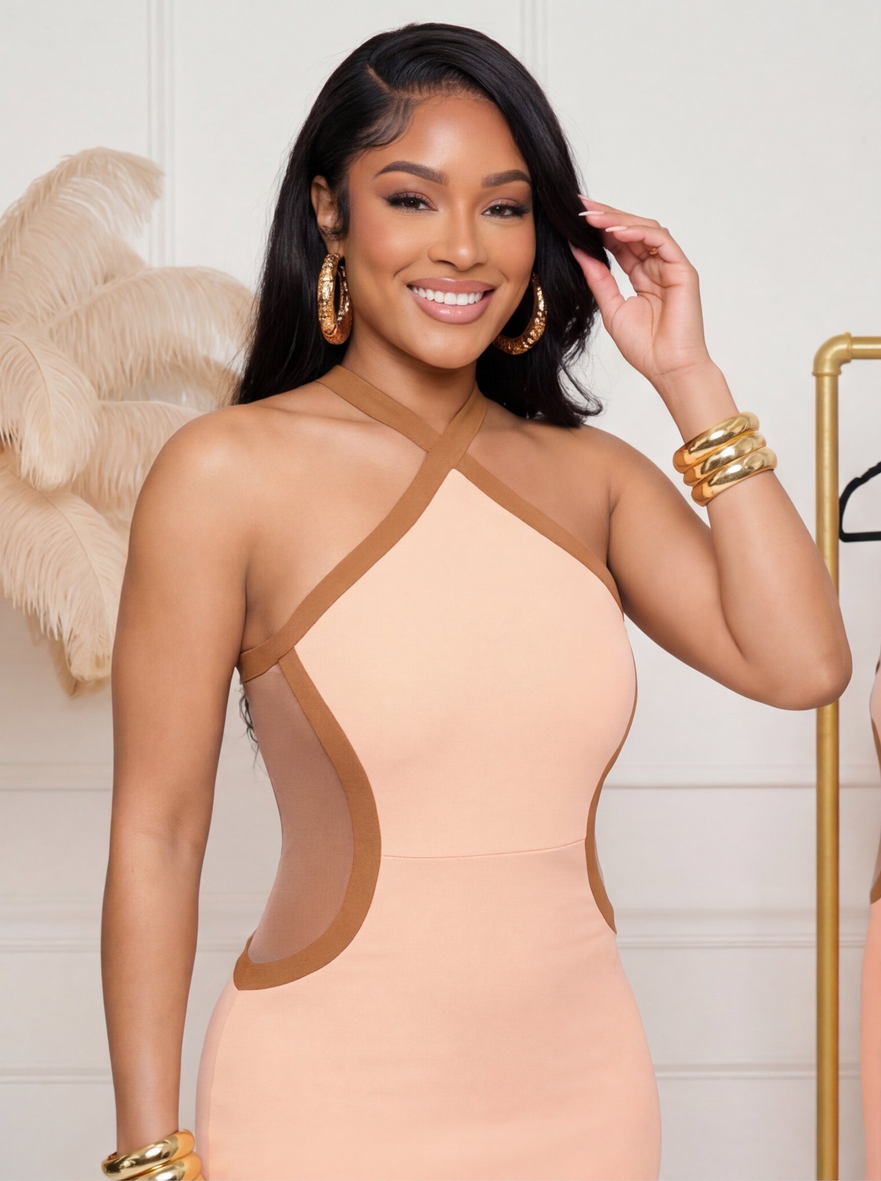 Woman modeling a peach dress in various poses with a white background and decorative elements.